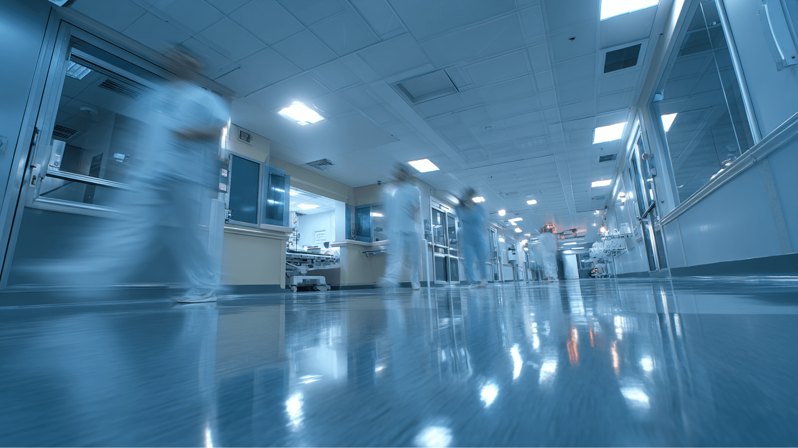 Hospital corridor with fast-moving medical team